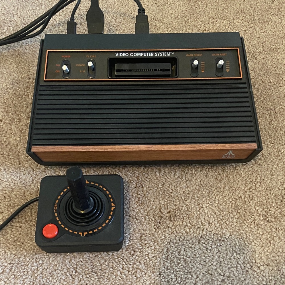 Atari Black and Brown Video Game Console